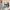 man in white dress shirt sitting beside woman in black long sleeve shirt